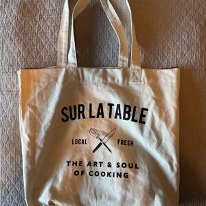 Sur La Table Cream Canvas Tote with Black Text